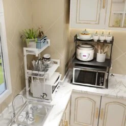 TammaT - Magnetronkast - Keukenrek - Magnetron Bovenkast - Ovenkast - Kruidenrek - Dubbel Laags Keukenkast Voor Boven Magnetron - Breedte Verstelbaar Magnetron Kast - Magnetron Rek - Metaal - Mat Zwart -Thuisopslag 1200x1200 717